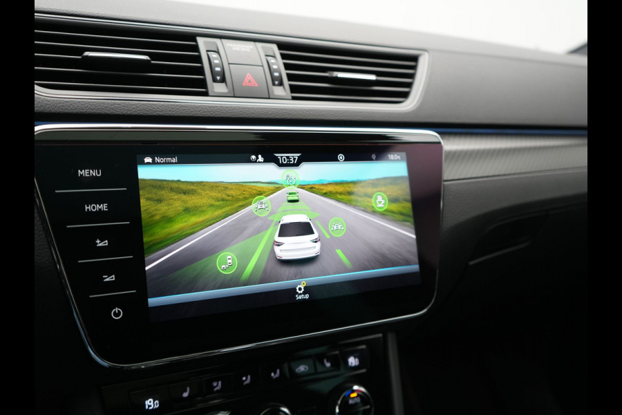 Škoda Superb Combi 1.4 TSI iV Sportline Business PHEV 218pk Dealer O.H. | SOH 91,2% | | Panodak | Adaptive Cruise | Camera | Canton Audio | Alcantara Sportstoelen Memory & Verwarmd | Sfeerverlichting | Keyless | BLIS | Stuur Verwarmd | Apple Carplay | Crystal LED | Navigatie | Plug In Hybrid |