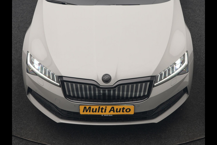 Škoda Superb Combi 1.4 TSI iV Sportline Business PHEV 218pk Dealer O.H. | SOH 91,2% | | Panodak | Adaptive Cruise | Camera | Canton Audio | Alcantara Sportstoelen Memory & Verwarmd | Sfeerverlichting | Keyless | BLIS | Stuur Verwarmd | Apple Carplay | Crystal LED | Navigatie | Plug In Hybrid |