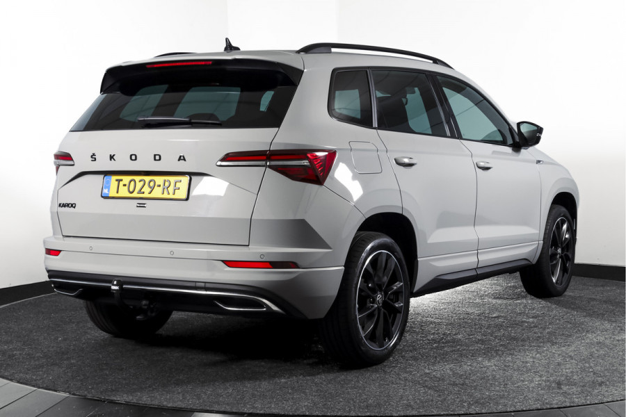 Škoda Karoq 1.5 TSI ACT 150 PK Sportline Business | Afn. Trekhaak | Dig. Cockpit | Adapt. Cruise | Stoel-+Stuurverw. | Matrix LED | Camera | NAV+App. Connect | ECC | Elek. Klep | LM 18" |