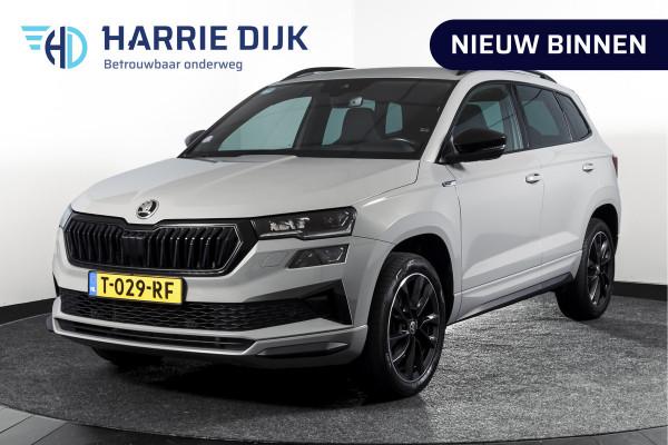 Škoda Karoq 1.5 TSI ACT 150 PK Sportline Business | Afn. Trekhaak | Dig. Cockpit | Adapt. Cruise | Stoel-+Stuurverw. | Matrix LED | Camera | NAV+App. Connect | ECC | Elek. Klep | LM 18" |