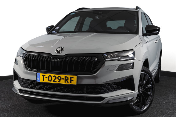 Škoda Karoq 1.5 TSI ACT 150 PK Sportline Business | Afn. Trekhaak | Dig. Cockpit | Adapt. Cruise | Stoel-+Stuurverw. | Matrix LED | Camera | NAV+App. Connect | ECC | Elek. Klep | LM 18" |