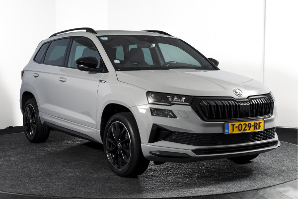Škoda Karoq 1.5 TSI ACT 150 PK Sportline Business | Afn. Trekhaak | Dig. Cockpit | Adapt. Cruise | Stoel-+Stuurverw. | Matrix LED | Camera | NAV+App. Connect | ECC | Elek. Klep | LM 18" |