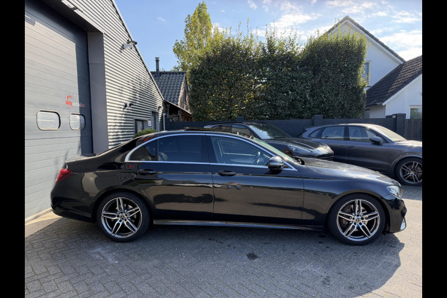 Mercedes-Benz E-Klasse 220 d AMG | Panoramadak | Camera | Sfeerverlichting | Navigatie | Stoelverwarming |