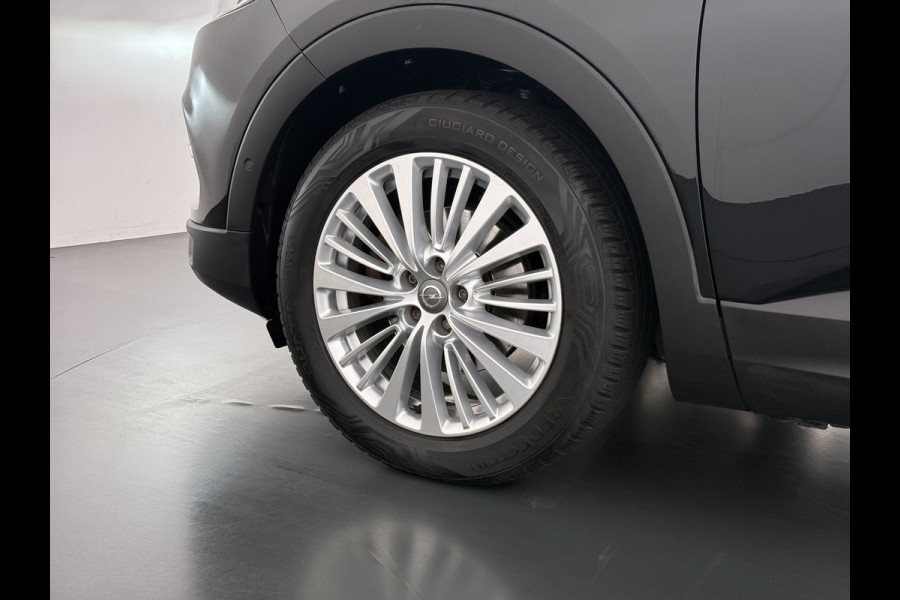 Opel Grandland X 1.2T 131pk Camera Apple/Android Elek.klep Bordherk. Blindspot 1/2Leer Navi Lane-dep. Keyless Aut.Verlichting Led Usb Tel. Ecc CruiseControl Innovation Regensensor Pdc Mistlampen Elek.Inkl.Spiegels 18''LM 1.2Turbo