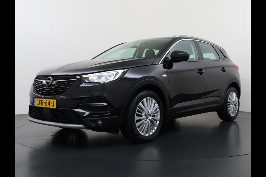 Opel Grandland X 1.2T 131pk Camera Apple/Android Elek.klep Bordherk. Blindspot 1/2Leer Navi Lane-dep. Keyless Aut.Verlichting Led Usb Tel. Ecc CruiseControl Innovation Regensensor Pdc Mistlampen Elek.Inkl.Spiegels 18''LM 1.2Turbo