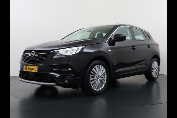 Opel Grandland X 1.2T 131pk Camera Apple/Android Elek.klep Bordherk. Blindspot 1/2Leer Navi Lane-dep. Keyless Aut.Verlichting Led Usb Tel. Ecc CruiseControl Innovation Regensensor Pdc Mistlampen Elek.Inkl.Spiegels 18''LM 1.2Turbo