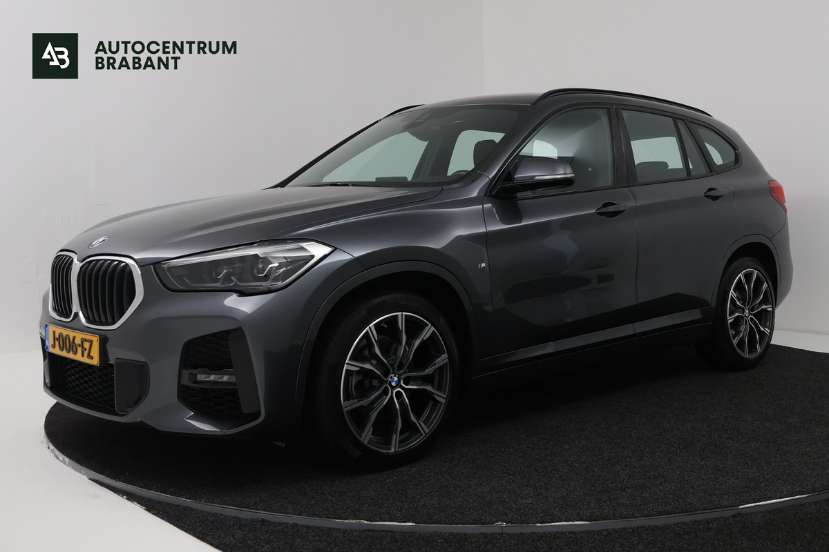 BMW X1 sDrive18i High Executive (SFEERVERLICHTING, NAVIGATIE, CRUISE CONTROL, DEALER ONDERHOUDEN)