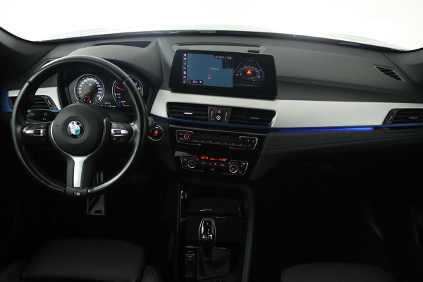 BMW X1 sDrive18i High Executive (SFEERVERLICHTING, NAVIGATIE, CRUISE CONTROL, DEALER ONDERHOUDEN)
