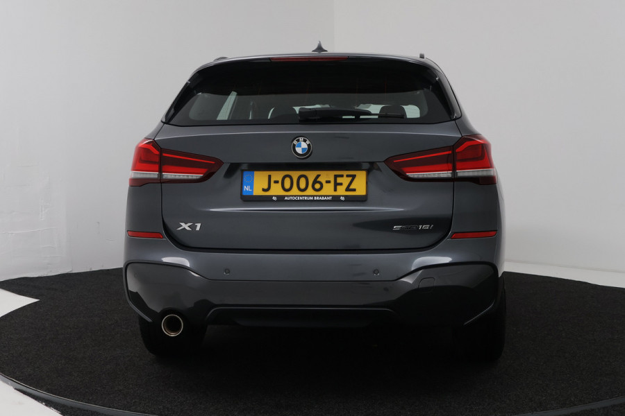 BMW X1 sDrive18i High Executive (SFEERVERLICHTING, NAVIGATIE, CRUISE CONTROL, DEALER ONDERHOUDEN)