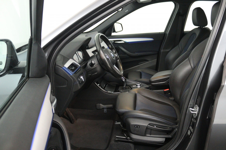 BMW X1 sDrive18i High Executive (SFEERVERLICHTING, NAVIGATIE, CRUISE CONTROL, DEALER ONDERHOUDEN)