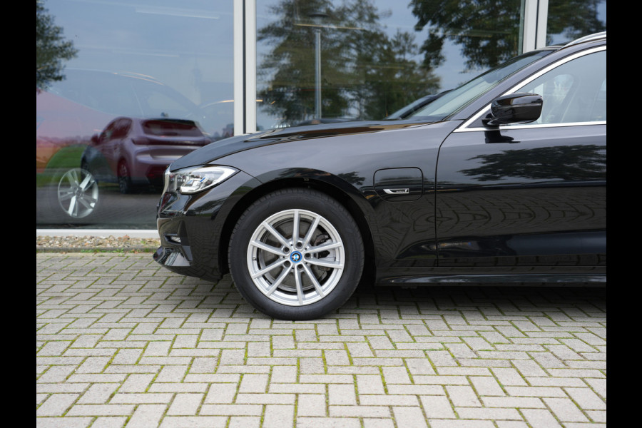 BMW 3 Serie Touring 320e xDrive Business Edition Plus | verwarmde voorstoelen | LED | Apple Carplay/Android Auto