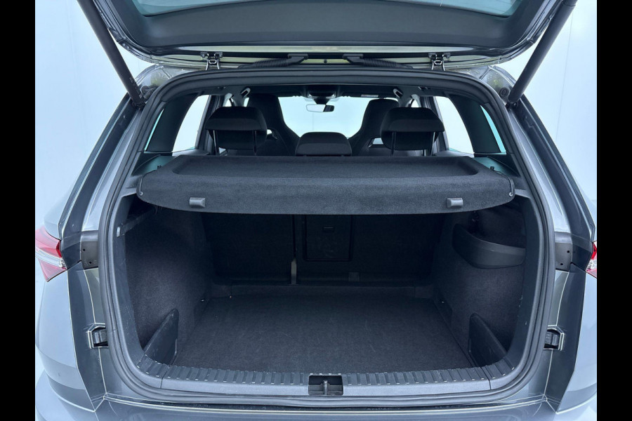 Škoda Karoq 1.5 TSI ACT Sportline Business 150 pk Automaat (DSG) | Verlengde garantie | Navigatie via App | Parkeersensoren | Achteruitrijcamera | Adaptieve cruise control | Stoelverwarming v/a | Verwarmde voorruit |