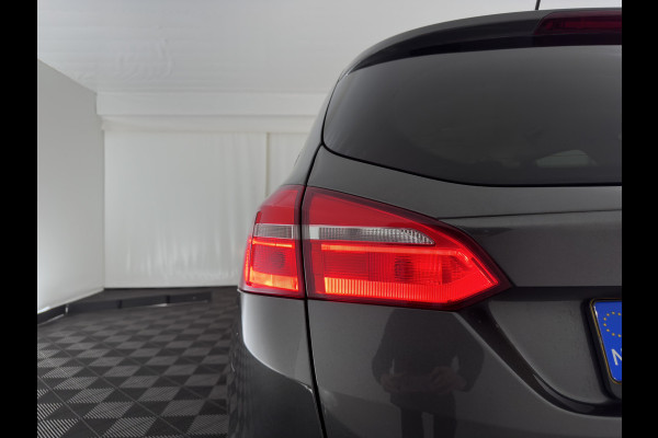 Ford FOCUS Wagon 1.5 TDCI Titanium (INCL.BTW) *NAVI-FULLMAP | HEATED-COMFORTSEATS | CAMERA | KEYLESS | PRIVACY-GLASS | ECC | PDC | CRUISE | 16''ALU*