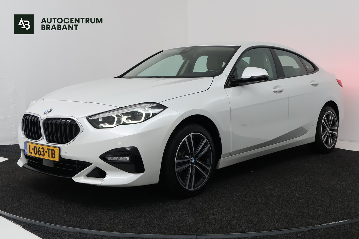 BMW 2 Serie Gran Coupé 220i Business Edition (CRUISE CONTROL, NAVIGATIE, SFEERVERLICHTING)
