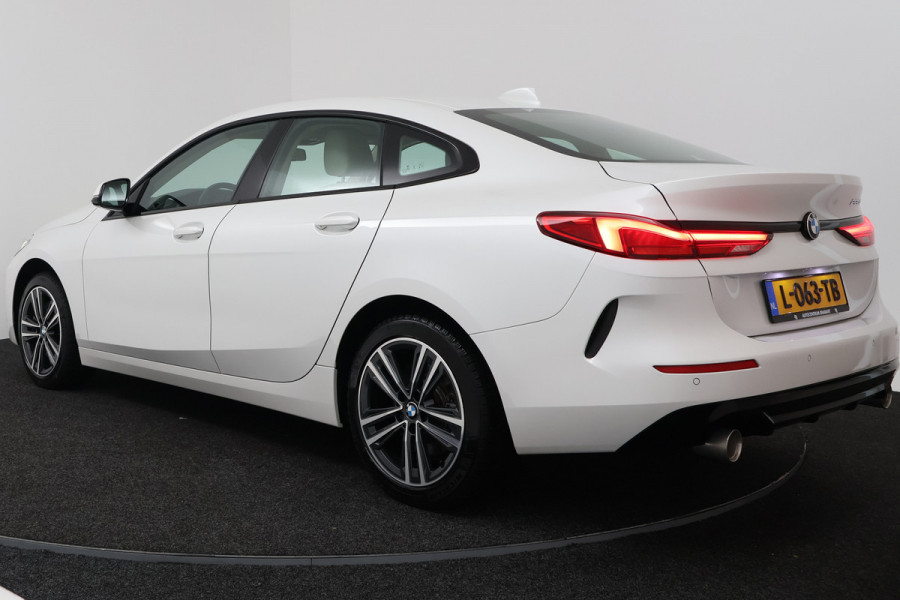 BMW 2 Serie Gran Coupé 220i Business Edition (CRUISE CONTROL, NAVIGATIE, SFEERVERLICHTING)