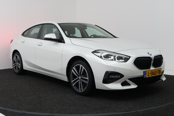 BMW 2 Serie Gran Coupé 220i Business Edition (CRUISE CONTROL, NAVIGATIE, SFEERVERLICHTING)