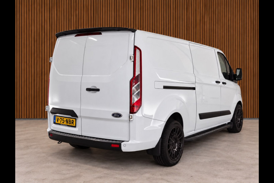 Ford Transit Custom 320 2.0 TDCI L2H1 | Raptor edition | CarPlay | Camera | Stoelverwarming | PDC V+A | Trekhaak | Airco | Nieuwe APK