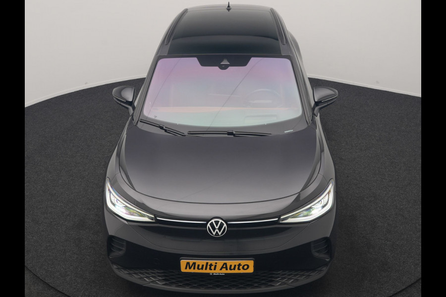 Volkswagen ID.4 Tech 77 kWh 204pk Dealer O.H. | Panodak | Adaptive Cruise | Head Up | 360 Camera | Warmtepomp | IQ Light | Alcantara Sportstoelen Memory & Massage | Stoelen & Stuur Verwarmd | Sfeerverlichting | Keyless | BLIS | 20"L.M |