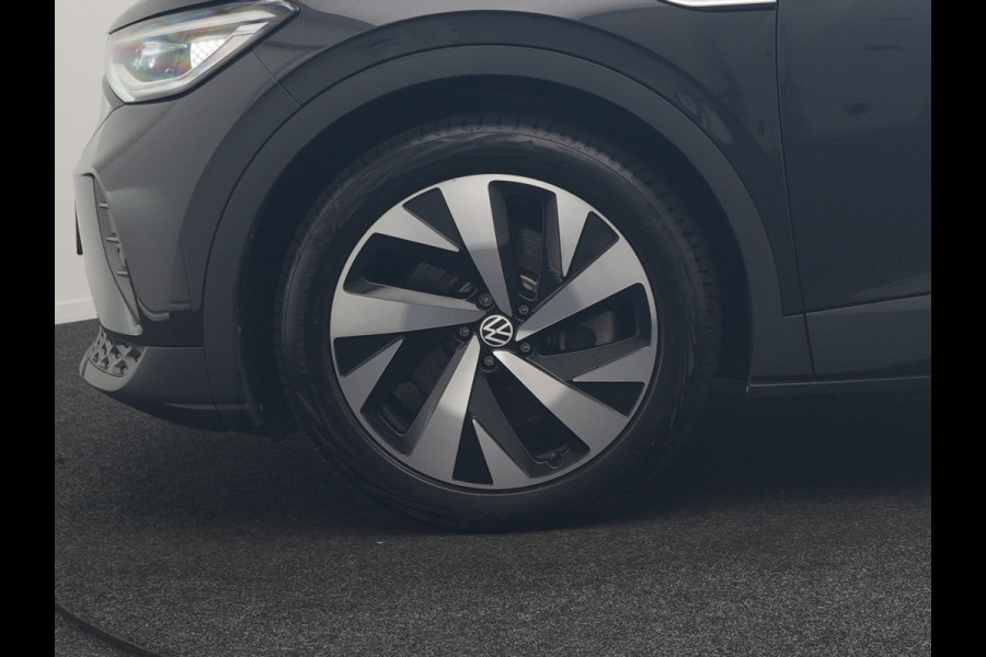 Volkswagen ID.4 Tech 77 kWh 204pk Dealer O.H. | Panodak | Adaptive Cruise | Head Up | 360 Camera | Warmtepomp | IQ Light | Alcantara Sportstoelen Memory & Massage | Stoelen & Stuur Verwarmd | Sfeerverlichting | Keyless | BLIS | 20"L.M |