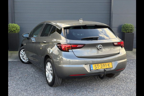 Opel Astra 1.0 Online Edition ✓2e Eigenaar✓Trekhaak✓Carplay✓Dealer Onderhouden✓Navi✓105pk✓Pdc V+A✓Clima✓Cruise✓Lm velgen✓N.A.P✓Apk tot 05-2027