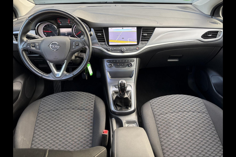 Opel Astra 1.0 Online Edition ✓2e Eigenaar✓Trekhaak✓Carplay✓Dealer Onderhouden✓Navi✓105pk✓Pdc V+A✓Clima✓Cruise✓Lm velgen✓N.A.P✓Apk tot 05-2027