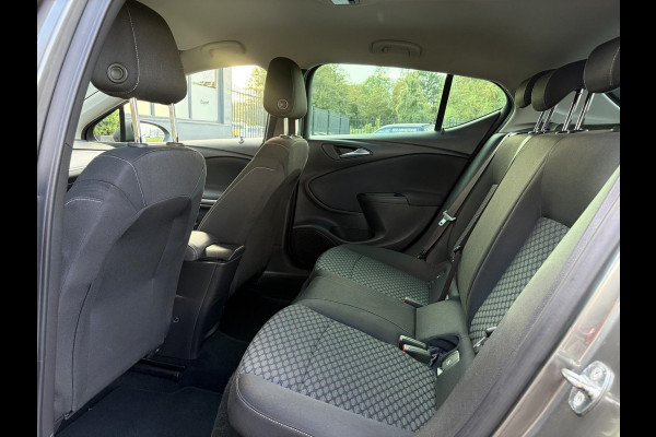 Opel Astra 1.0 Online Edition ✓2e Eigenaar✓Trekhaak✓Carplay✓Dealer Onderhouden✓Navi✓105pk✓Pdc V+A✓Clima✓Cruise✓Lm velgen✓N.A.P✓Apk tot 05-2027