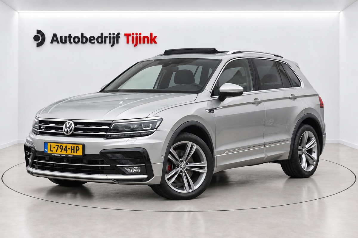 Volkswagen Tiguan 2.0 TSI 4MOTION 220PK R-Line | Pano | HUD | Dynaudio | Leder | Stoelverwarming | 360 camera | Lane/Park/Light Assist |  Vol |
