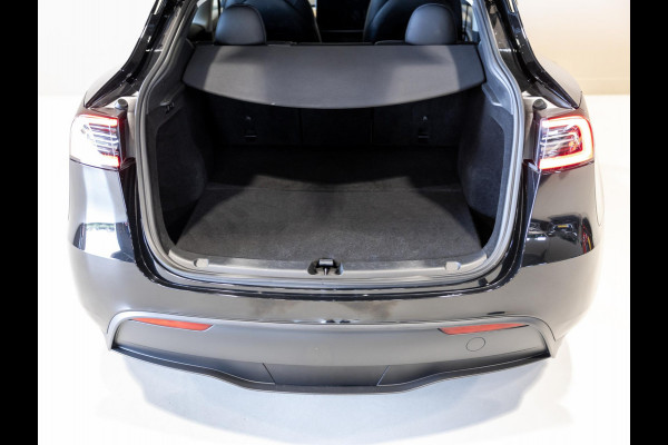 Tesla Model Y RWD 58 kWh SOH 93% / 299pk / Trekhaak /