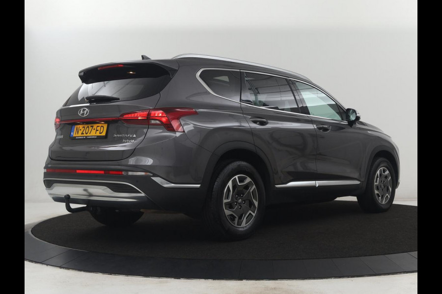 Hyundai Santa Fe 1.6 T-GDI HEV Comfort Smart Sky 7p. | Panoramadak | Leder | Adaptive cruise | Dodehoek detectie | Stoelverwarming | KRELL Sound | Trekhaak | Camera | Park assist | Carplay