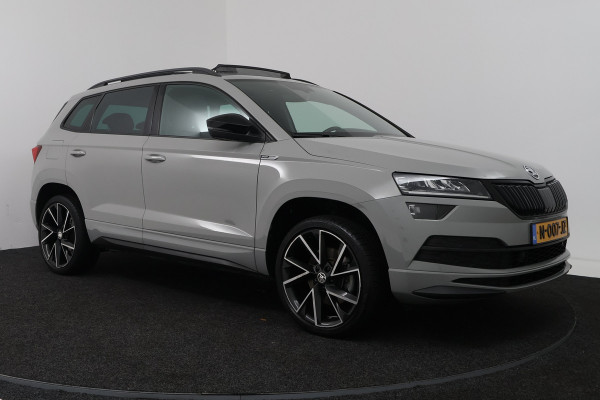 Škoda Karoq 1.5 TSI ACT Sportline Business (PANORAMADAK, TREKHAAK, STOEL/STUUR VERWARMING, CAMERA)
