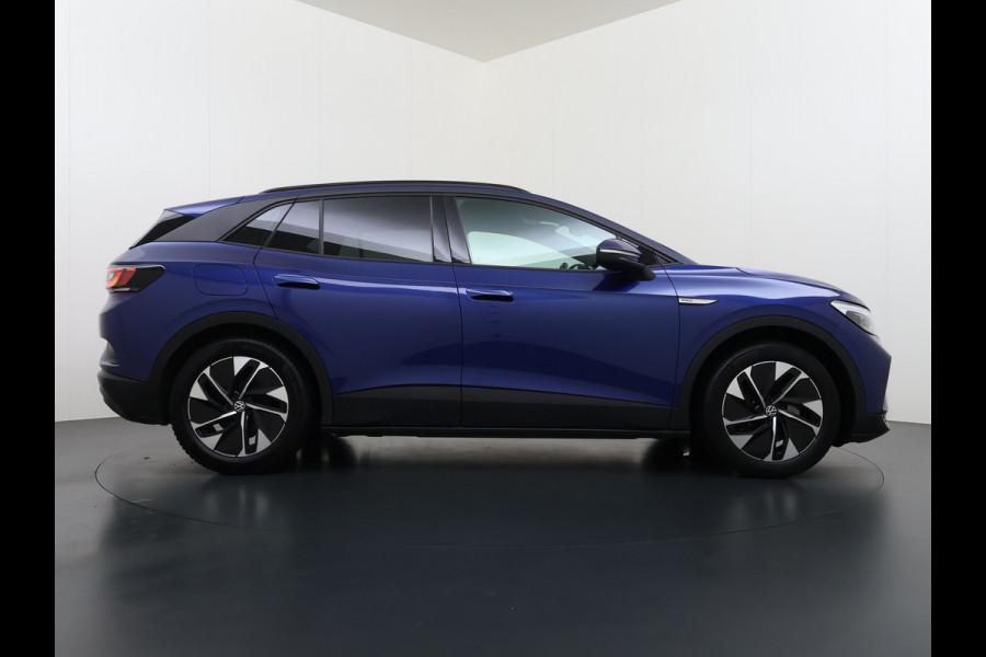 Volkswagen ID.4 82kWh 204PK 90%SOH Trekhaak Adap.Cruise Stoelverwarming Apple Carplay Android Auto Navi Ecc Pdc Privacy Glas Led Isofix DAB Bluetooth All Seasonbanden Voorruitverwarming Wifi 1.000KG Trekgewicht 1e Eigenaar Origineel Nederlandse Auto