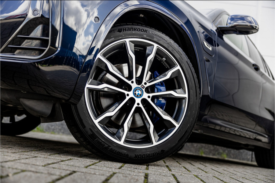 BMW X3 xDrive30e High Executive M-Sport Panorama / Electrische stoel / Trekhaak / Camera /