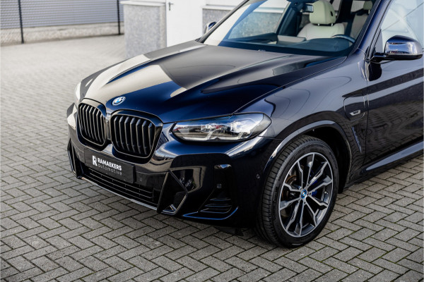BMW X3 xDrive30e High Executive M-Sport Panorama / Electrische stoel / Trekhaak / Camera /