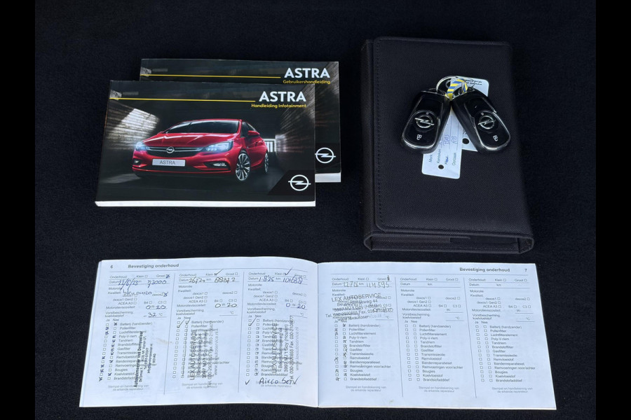 Opel Astra Sports Tourer 1.4 Innovation ✓Trekhaak✓Camera✓Carplay✓Navi✓Recent beurt gehad✓150pk✓Keyless✓Halfleder✓6 Bak✓Rijstrooksensor✓Dodehoeksensor✓Pdc V+A✓Lm velgen✓Clima✓Cruise✓N.A.P✓Apk tot 09-2027