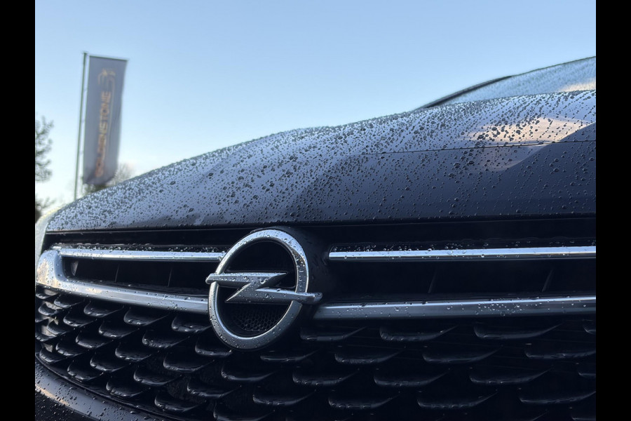 Opel Astra Sports Tourer 1.4 Innovation ✓Trekhaak✓Camera✓Carplay✓Navi✓Recent beurt gehad✓150pk✓Keyless✓Halfleder✓6 Bak✓Rijstrooksensor✓Dodehoeksensor✓Pdc V+A✓Lm velgen✓Clima✓Cruise✓N.A.P✓Apk tot 09-2027