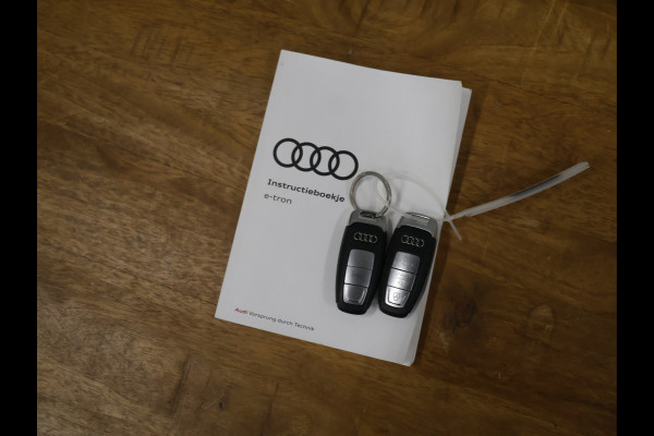 Audi e-tron 55 quattro Business edition Plus 95 kWh [SCHUIFKANTELDAK, APPLE CARPLAY, ANDROID,  ADAPTIVE CRUISE CONTROL, STOELVERWARMING, MEMORY SEATS, DIGITAL DASH, PDC V+A, LEDER, ELEKTRISCHE ACHTERKLEP, NAVIGATIE, CLIMATE CONTROL, NIEUWSTAAT