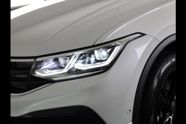 Volkswagen Tiguan 1.4 TSI eHybrid R-Line Business 245 pk Automaat (DSG) | Navigatie | Panoramadak | Parkeersensoren (Park assist) | Rondomzicht camera | Lederen bekleding | Elektr. voorstoelen met geheugen | Black Style pakket | R-Line |