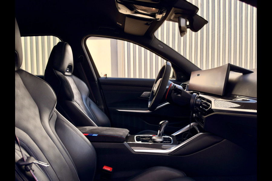 BMW 3 Serie Touring M3 xDrive Competition Volledig Akrapovič! | M Drivers Package | Vol Carbon