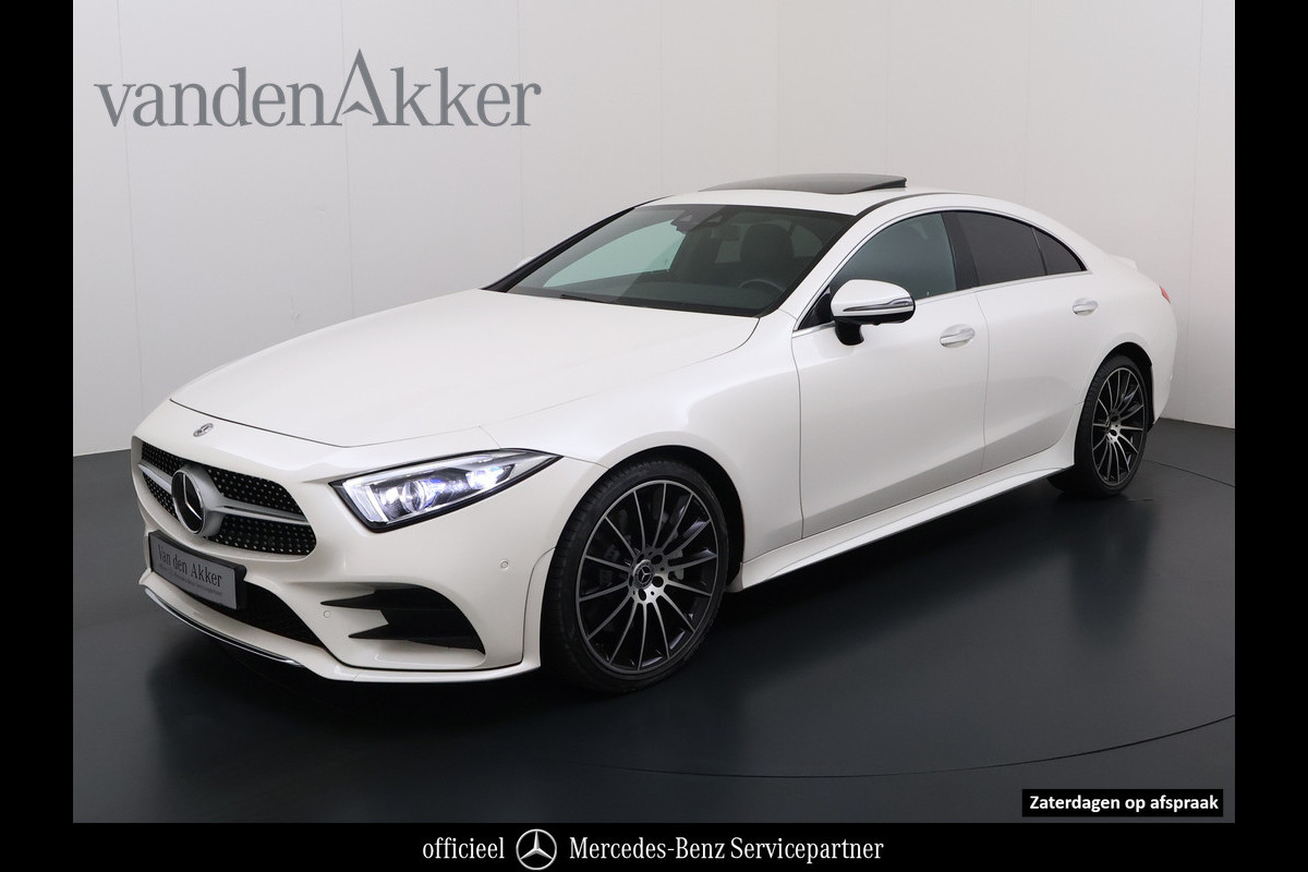 Mercedes-Benz CLS-Klasse 450 4Matic AMG // Burmester // 360 Camera // Dealer onderhouden // Sunroof // Trekhaak // 20 inch // Designo White // Distronic