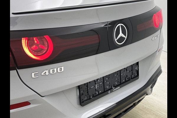 Mercedes-Benz C-Klasse 400 4MATIC Launch Edition 94 kWh | Premium pakket | Winterpakket | Rijassistentiepakket Plus | Sportstoelen pakket | Trekhaak | Panoramisch dak | Sierelementen zwart scheepsdek hout | 20" multispaaks lichtmetalen AMG velgen |