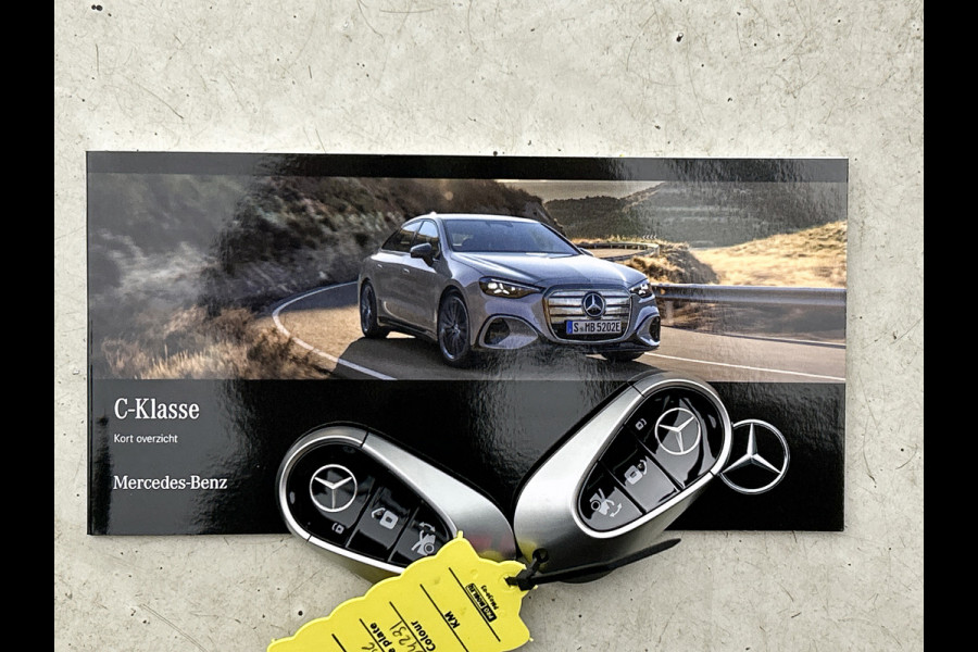 Mercedes-Benz C-Klasse 400 4MATIC Launch Edition 94 kWh | Premium pakket | Winterpakket | Rijassistentiepakket Plus | Sportstoelen pakket | Trekhaak | Panoramisch dak | Sierelementen zwart scheepsdek hout | 20" multispaaks lichtmetalen AMG velgen |