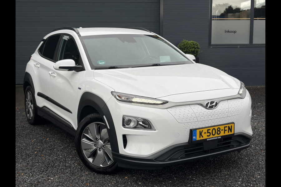 Hyundai Kona EV Fashion 64 kWh ✓2e Eigenaar✓Carplay✓Camera✓Trekhaak✓Dealer Onderhouden✓Draadloze telefoonlader✓Navi✓Keyless✓✓Rijstrooksensor✓Dodehoeksensor✓Pdc✓Lm velgen 17"✓Clima✓Cruise✓204pk✓N.A.P✓Bj 12-2020✓Apk tot 09-2028