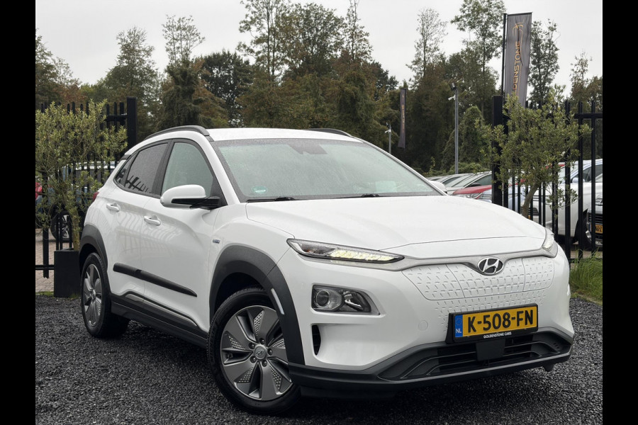 Hyundai Kona EV Fashion 64 kWh ✓2e Eigenaar✓Carplay✓Camera✓Trekhaak✓Dealer Onderhouden✓Draadloze telefoonlader✓Navi✓Keyless✓✓Rijstrooksensor✓Dodehoeksensor✓Pdc✓Lm velgen 17"✓Clima✓Cruise✓204pk✓N.A.P✓Bj 12-2020✓Apk tot 09-2028