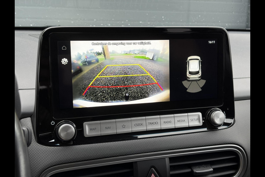 Hyundai Kona EV Fashion 64 kWh ✓2e Eigenaar✓Carplay✓Camera✓Trekhaak✓Dealer Onderhouden✓Draadloze telefoonlader✓Navi✓Keyless✓✓Rijstrooksensor✓Dodehoeksensor✓Pdc✓Lm velgen 17"✓Clima✓Cruise✓204pk✓N.A.P✓Bj 12-2020✓Apk tot 09-2028