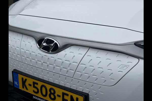 Hyundai Kona EV Fashion 64 kWh ✓2e Eigenaar✓Carplay✓Camera✓Trekhaak✓Dealer Onderhouden✓Draadloze telefoonlader✓Navi✓Keyless✓✓Rijstrooksensor✓Dodehoeksensor✓Pdc✓Lm velgen 17"✓Clima✓Cruise✓204pk✓N.A.P✓Bj 12-2020✓Apk tot 09-2028