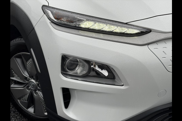 Hyundai Kona EV Fashion 64 kWh ✓2e Eigenaar✓Carplay✓Camera✓Trekhaak✓Dealer Onderhouden✓Draadloze telefoonlader✓Navi✓Keyless✓✓Rijstrooksensor✓Dodehoeksensor✓Pdc✓Lm velgen 17"✓Clima✓Cruise✓204pk✓N.A.P✓Bj 12-2020✓Apk tot 09-2028
