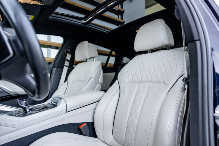 BMW X6 M50i High Executive - M Sport | Panorama | 4-wielsturing | H&K | Soft Close | 360 Camera