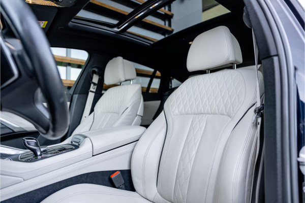 BMW X6 M50i High Executive - M Sport | Panorama | 4-wielsturing | H&K | Soft Close | 360 Camera