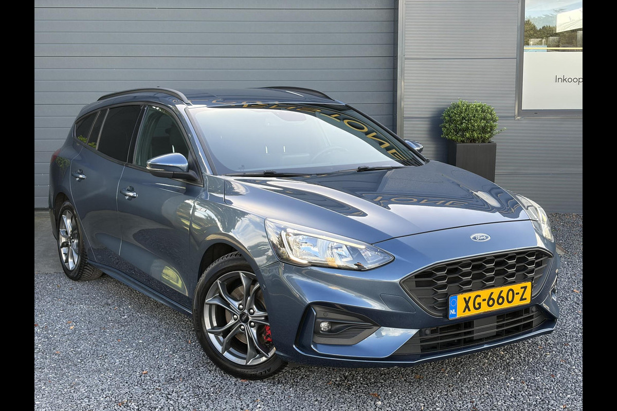 Ford FOCUS Wagon 1.0 EcoBoost ST Line Business ✓2e Eigenaar✓Navi✓Camera✓Carplay✓Afn.Trekhaak✓125pk✓Keyless✓Stoelverw✓Stuurverw✓6 Bak✓Dealer Onderhouden✓17'' Lm velgen✓Pdc V+A✓N.A.P✓Apk tot 02-2027