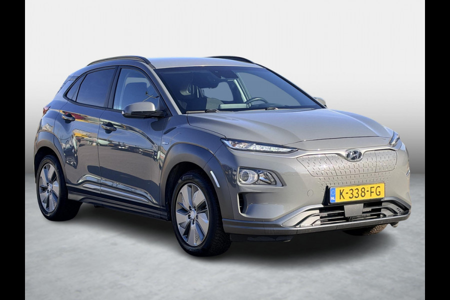 Hyundai Kona EV Fashion 39 kWh SoH 89.9% | 3 Fase | Warmtepomp | Fabrieksgarantie | Camera | Navigatie | Adaptieve Cruise | Dealeronderhouden |